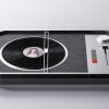 A minimalist turntable designed around cameras and typewriters